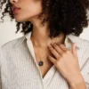 Scorpio Sutton Zodiac Gold-Tone Stainless Steel Black Sandstone Pendant Necklace Scorpio Sutton Zodiac Gold-Tone Stainless Steel Black Sandstone Pendant Necklace
